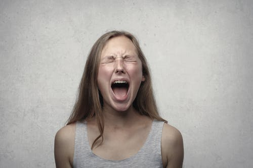 Woman screaming in anger